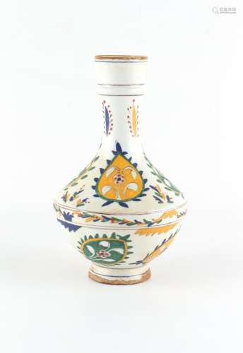 A Turkish Ottoman Kutahya pottery wine flagon, painted with ...