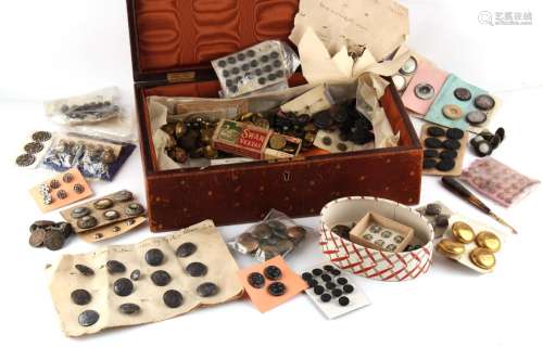 Property of a lady - a leather box containing assorted butto...
