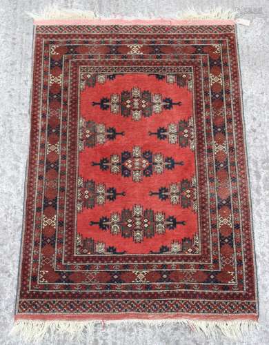 Property of a gentleman - a Belouch rug, with red ground, 59...