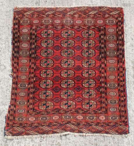 Property of a gentleman - a Turkoman rug, with three rows of...