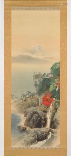 A Japanese scroll painting on silk depicting a mountainous r...