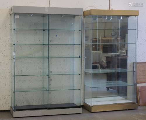 Two similar shop display cabinets, each with two sliding doo...