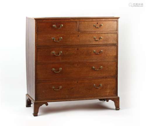 Property of a lady - a George III oak chest of two short &am...