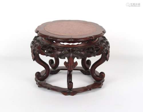 A Chinese hongmu & burr wood stand, well carved with lin...
