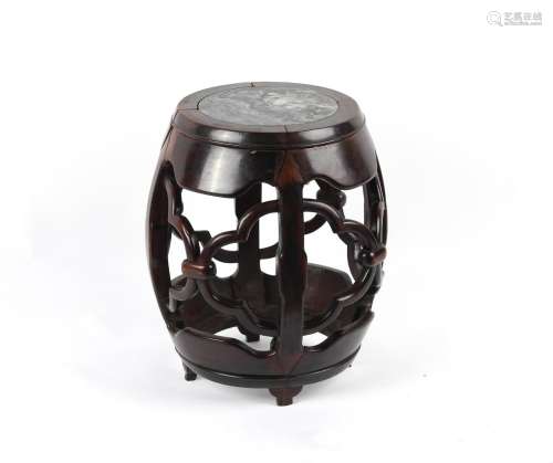 A late 19th century Chinese carved hongmu drum seat with ins...