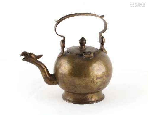 A bronze ewer with parrot mask spout, probably Chinese and 1...