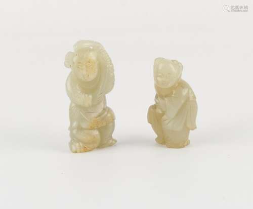 Two Chinese pale celadon jade carvings of Boys, 19th / early...