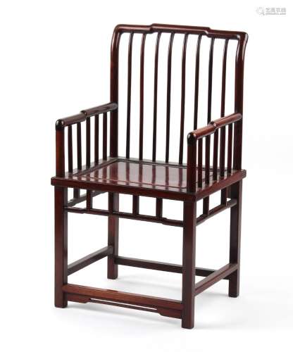 A Chinese hongmu armchair, with spindle back & arm suppo...