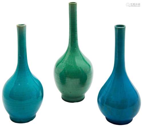 THREE MONOCHROME-GLAZED BOTTLE VASES QING DYNASTY, 19TH CENT...