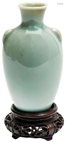 SMALL CELADON VASE QING DYNASTY, 19TH CENTURY of baluster fo...