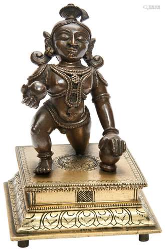 BRONZE FIGURE OF AN INFANT KRISHNA INDIA, 19TH CENTURY the f...