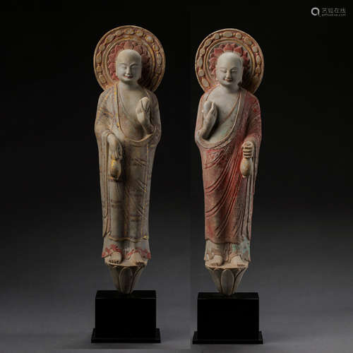 A PAIR OF PAINTED STONE CARVED BUDDHA STATUE, NORTHERN WEI D...