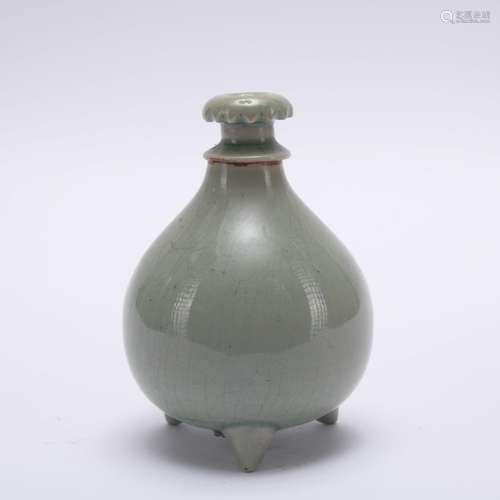 A celadon-glazed jar