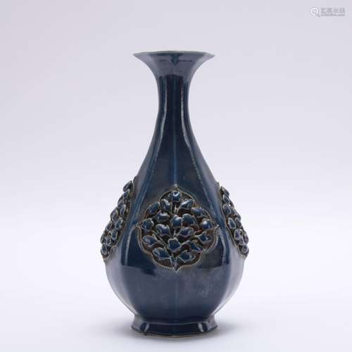 A blue glazed vase