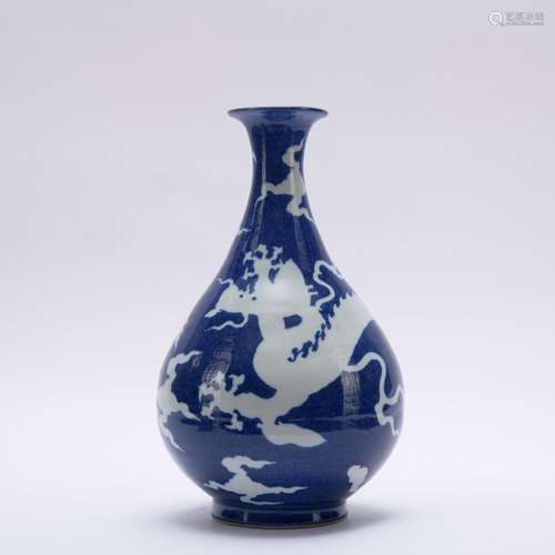 A blue glazed 'dragon' pear-shaped vase