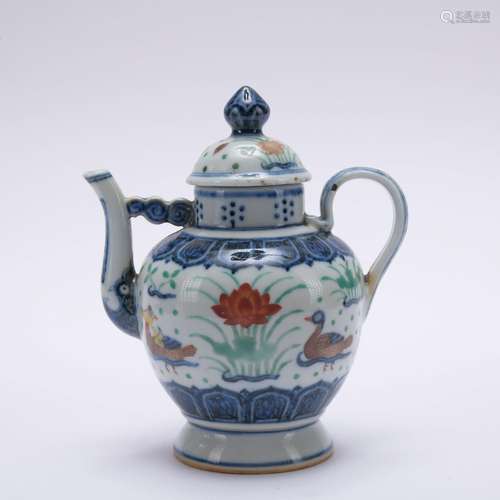 A blue and white Wu cai 'Mandarin Duck' ewer