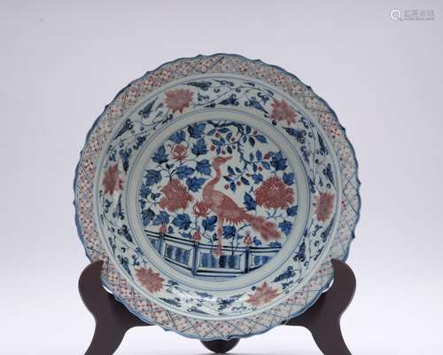 An underglaze-blue and copper-red 'floral' dish