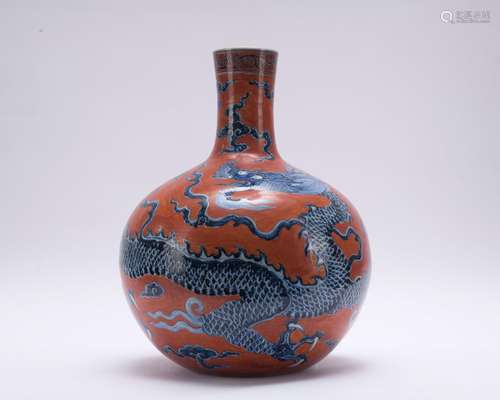 A blue and white and red-ground 'dragon' globular vase