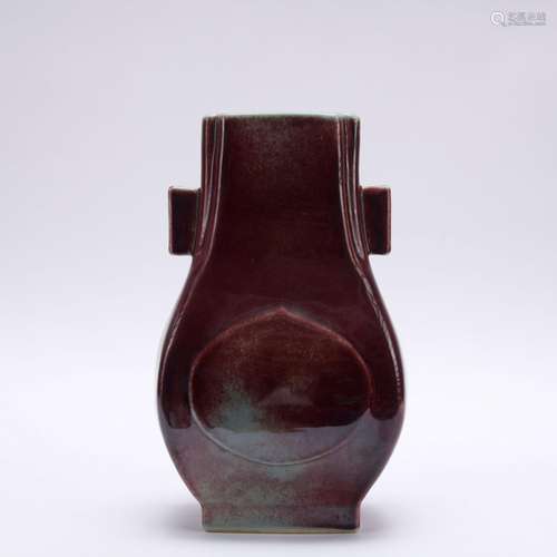 A red-glazed vase