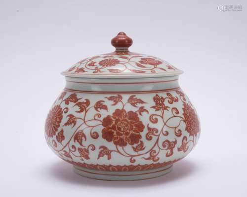 An allite red glazed 'floral' jar