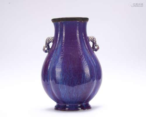 A flambe glazed vase with two ears