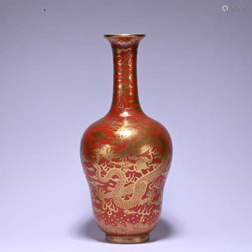 An allite red glazed 'dragon' vase painting in gold