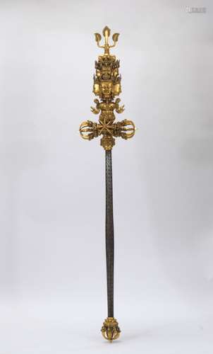 A gilt-bronze staff