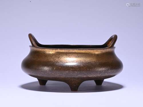 A bronze censer