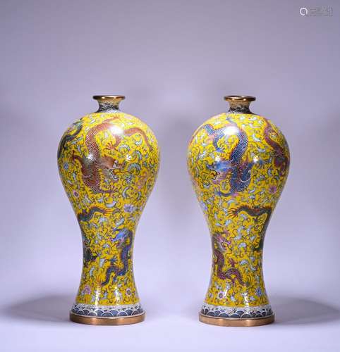 A pair of enamel vase