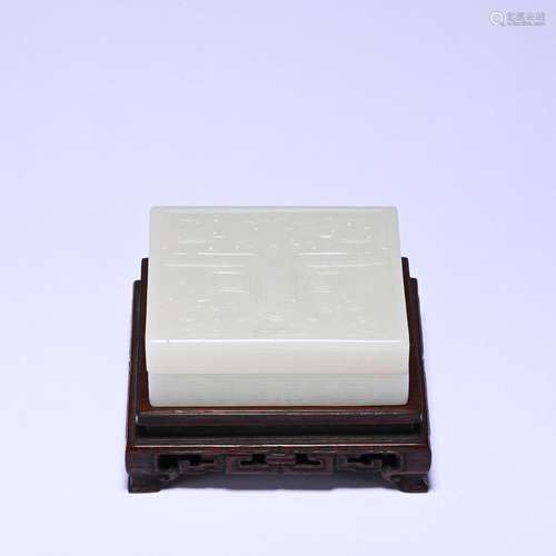 A white jade box and cover