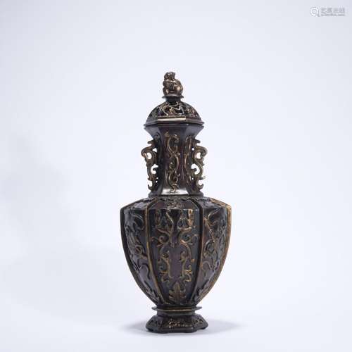 An eaglewood vase and cover