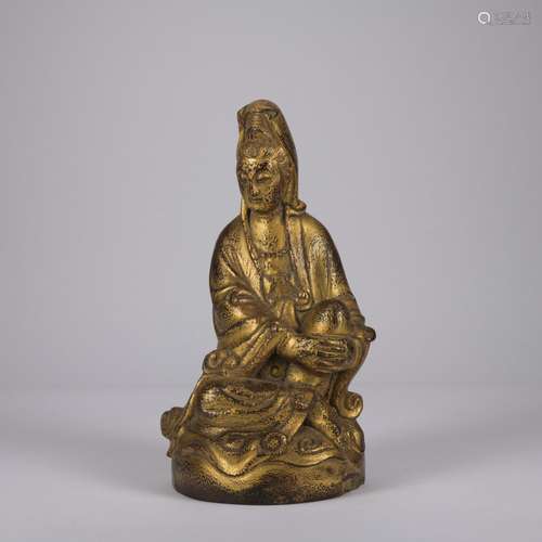 A wooden statue of Avalokitesvara