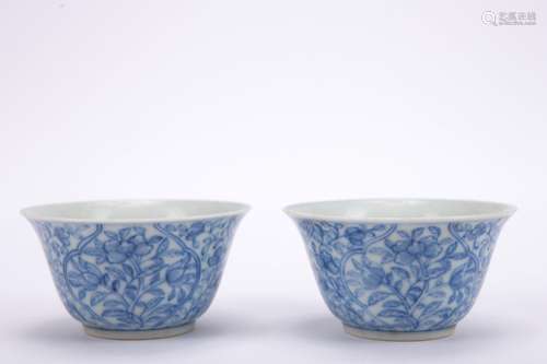 A pair of blue and white 'floral' cup