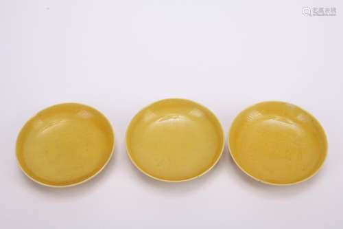 Three yellow Ge glazed dishes