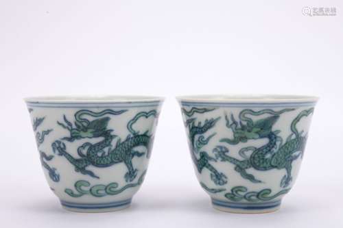 A pair of Dou cai 'dragon' cup