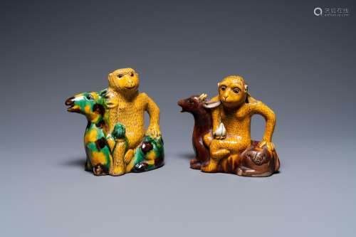 Two Chinese sancai-glazed 'monkey on deer' ewers, 19th C.