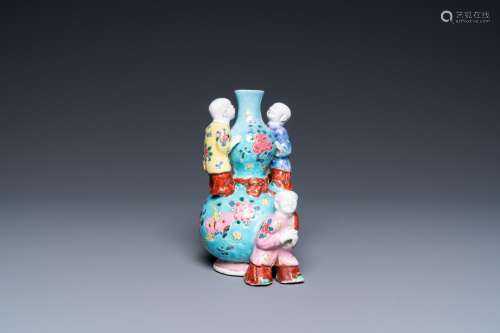 A Chinese famille rose double gourd vase with three boys, Qi...
