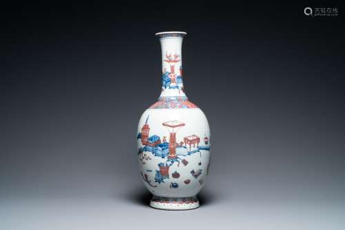 A Chinese blue, white and copper red 'antiquities' bottle va...