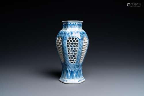 A Chinese reticulated double-walled blue and white vase, Kan...