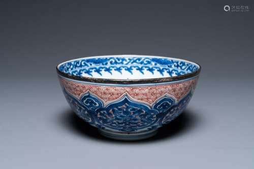 A Chinese blue, white and iron-red bowl, Kangxi mark and of ...