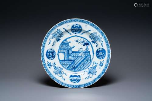 A Chinese blue and white dish with a boy on a terrace, Kangx...