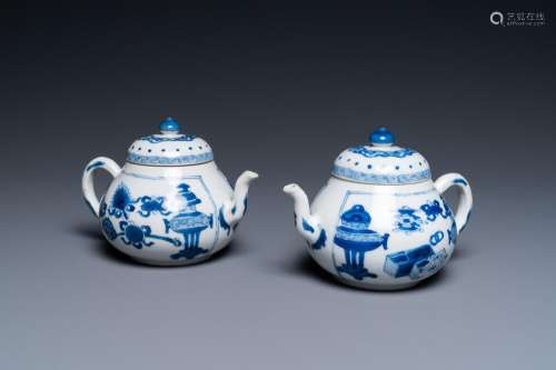 A pair of Chinese blue and white 'antiquities' teapots, Kang...