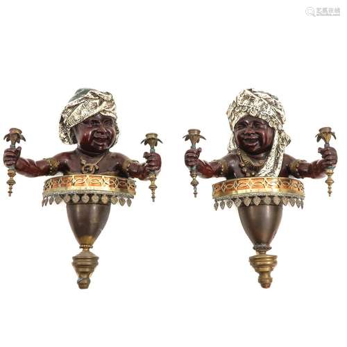 A Pair of Bronze Wall Sconces