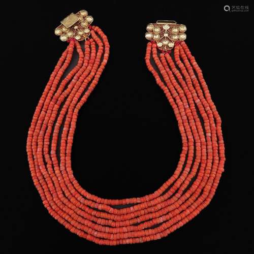 A 19th Century 7 Strand Red Coral Necklace on Gold Clasp