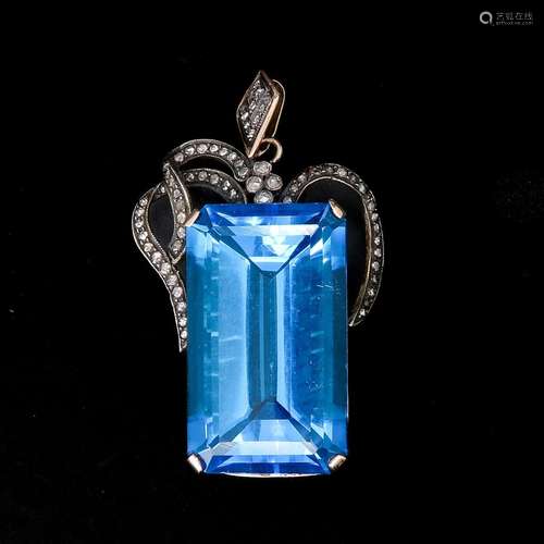 A Blue Topaz and Diamond Pendant