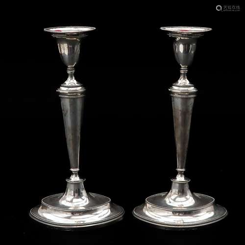 A Pair of Dutch Silver Empire Candlesticks