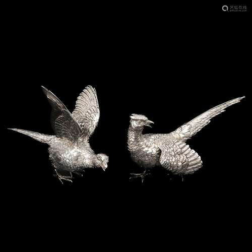 A Pair of Silver Bird Table Sculptures