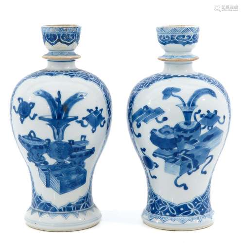 A Pair of Blue and White Candlesticks