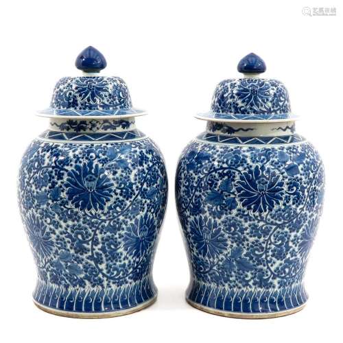 A Pair of Large Vases with Covers