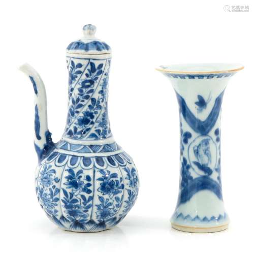 A Small Blue and White Pitcher and Vase